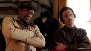 Yasiin Bey as Ordell Robbie & John Hawkes as Louis Gara