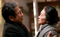 Chen Daoming as Lu Yanshi and Gong Li as Feng Wanyu in 'Coming Home' 