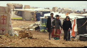 HE NAMED ME MALALA: Ziauddin Yousafzai and Malala Yousafzai and Syrian refugee Rimah in Syrian Refugee Tent Camp in Jordan. Feb 17, 2014.  Photo courtesy of Fox Searchlight Pictures.© 2015 Twentieth Century Fox Film Corporation All Rights Reserved 